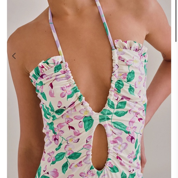 Palmacea, one piece, tied swimsuit with cut outs.  
Size M - Picture 10 of 12
